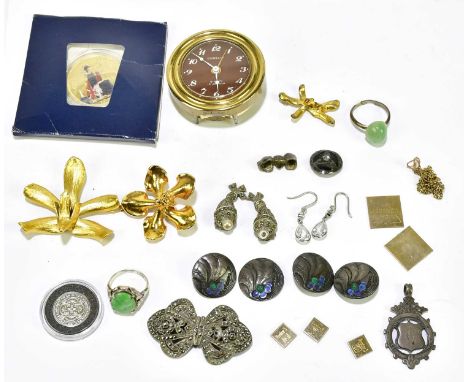 A small group of costume jewellery including a set of four silver buttons, marcasite jewellery, encapsulated coin, etc. 