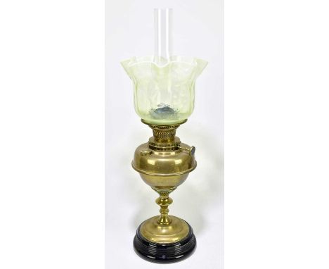 A Victorian brass oil lamp, with vaseline glass shade, moulded with floral detail, with Young's burner, height including chim