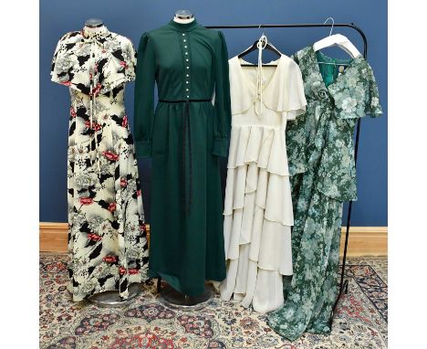 Four original 1970s full length dresses including a Sixth Sense at C &amp; A, a floral green gown with flower detail to front