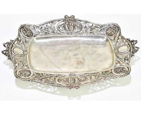 A Continental 800 grade silver bowl of shaped rectangular form with cast border decorated with oval and circular panels depic