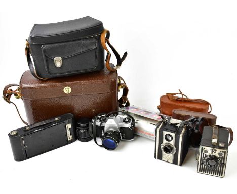 A collection of assorted cameras and accessories to include Argus Range Finder with 3.5-50mm Argus coated lens, a Pentax Spor