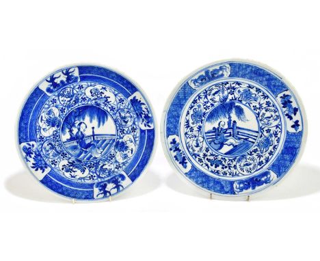 A pair of 19th century blue and white Japanese plates in the Chinese style, diameter 30cm.Condition Report: Minor chipping ar
