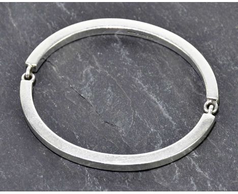 GEORG JENSEN; a boxed silver two section bangle, internal width approx 70mm, 50.2g.Condition Report: Light surface wear