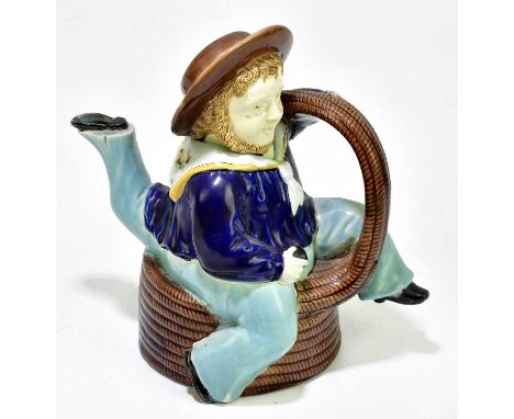 JOSEPH HOLDCROFT; a 19th century majolica novelty teapot modelled as a seated sailor, impressed to the underside, height 21cm