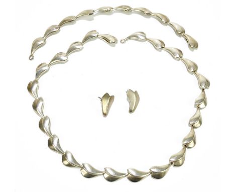 GEORG JENSEN; a set of Infinity sterling silver hallmarked jewellery comprising a necklace, 38cm, a bracelet, 16cm, and a set