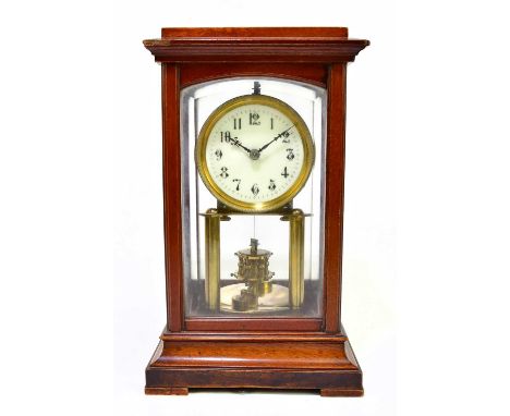 An early 20th century four glass mantel clock, the circular dial set with Arabic numerals, on bracket feet, height 32cm.