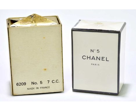 CHANEL NO.5; a vintage original boxed and unopened 7cc perfume bottle with all original cellophane and paper packaging.Condit