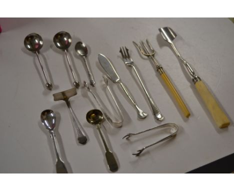 A Victorian ivory handled and plated Stilton scoop; a Victorian ivory handled and plated hand fork; an Art Nouveau plated sug