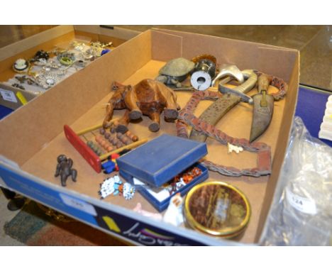 A tray containing a miniature abacus, Eastern daggers, a novelty snuff box on the form of a tortoise, a small box of jeweller