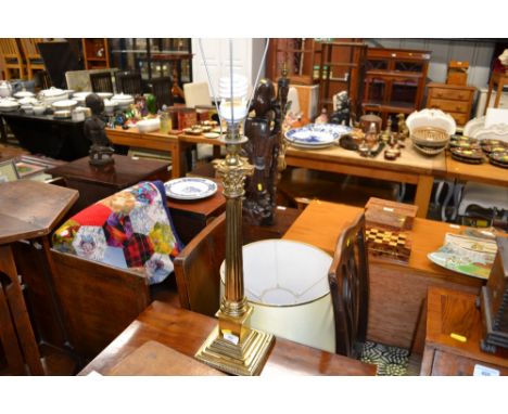A brass Corinthian column table lamp and shade 