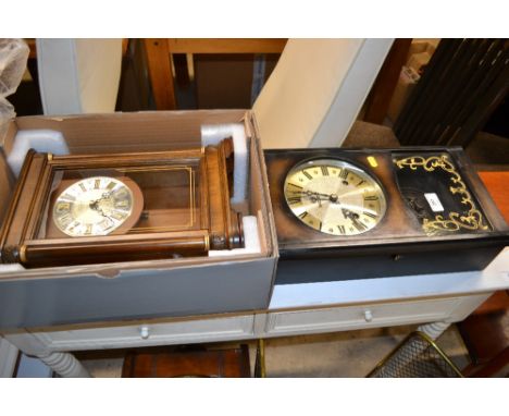 A Seiko mantel clock and a modern wall clock 