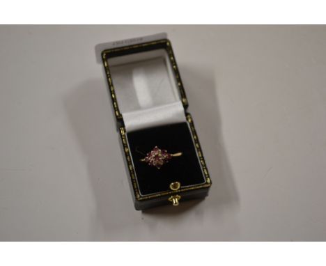 A yellow metal ruby set ring 