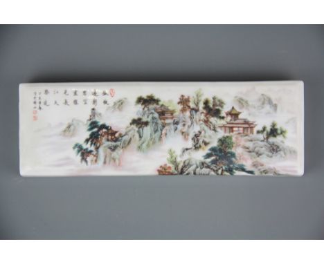 A Chinese porcelain scroll weight, 23.5 x 7.5 x 3cm.