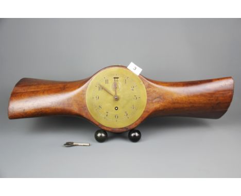 A World War II aeroplane propeller mantle clock, W. 63cm.