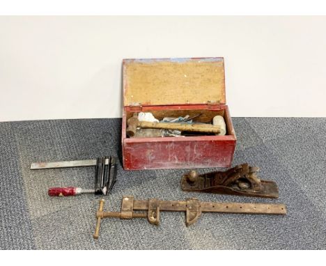 A vintage Stanley woodworking plain and other tools.