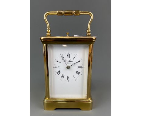 A gilt brass striking carriage clock, H. 17cm.