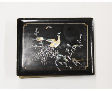 A mother of pearl inlaid oriental postcard album containing First World War silk post cards.