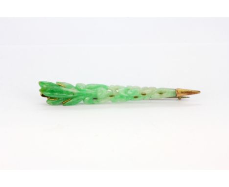 A beautiful 1920's yellow metal (tested minimum 9ct gold) mounted carved jade brooch, L. 8.5cm.
