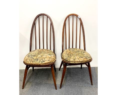 Two Ercol high backed dining chairs.