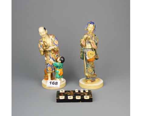 A pair of 19th century Japanese Satsuma figurines, H. 18cm (one A/F), together with a Shibayama decorated game marker.