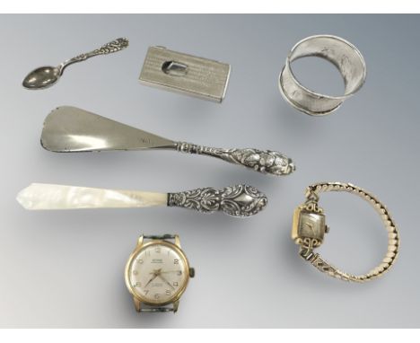 A gent's gold-plated watch face signed Flora Waterproof, a lady's Oris wristwatch, two silver-handled items, a caddy spoon, s