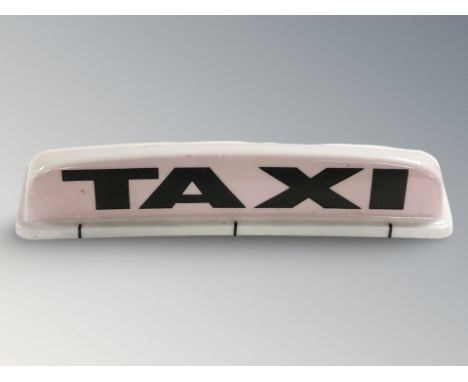 A taxi roof light, width 62 cm.