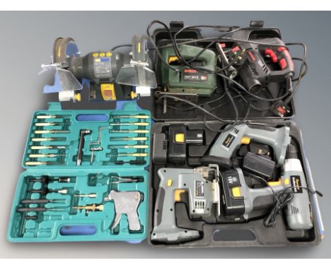 A Nutool bench top disc grinder, a Bosch jigsaw, a further jigsaw, boxed PowerG cordless drill, sander and jigsaw, and a furt