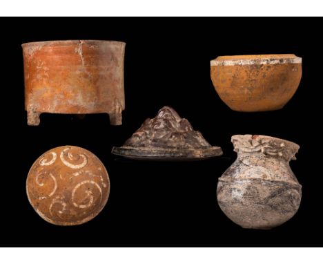 Neolithic China, Ca. 7000 - 1700 BC and Han dynasty, Ca. 202 BC - AD 220.A collection of five Chinese Neolithic to Han dynast