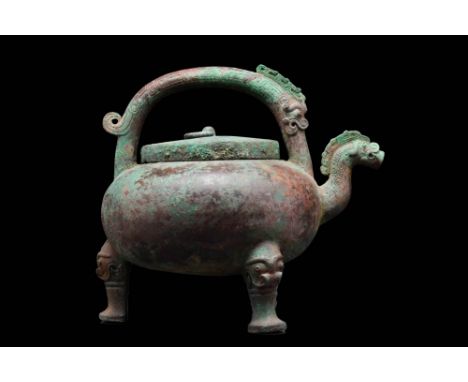 Eastern Zhou Dynasty/Warring States Period, Ca. 475 - 221 BC.The heavily-cast vessel, with a spherical body, supported on thr