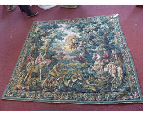 A 20th Century wall hanging tapestry, machine made possibly French depicting a figural scene with people on horseback and dog