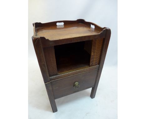 A Georgian mahogany bedside commode cabinet with sliding tambour door above pullout commode raised on square legs, H:81cm W:5