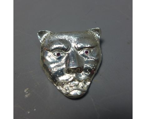 Silver panther head pendant, set with ruby eyes 