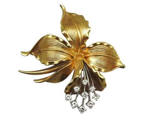 Schwere Brosche in Form einer Orchidee aus 18 k GG gestempelt, Blütenblätter und Stengel in Gold, stilisierte Staubfäden aus 