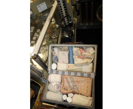 A VINTAGE FRENCH FIRST AID KIT CONTAINED IN A SMALL CASE TOGETHER WITH A  VINTAGE A BLOOD PRESSURE MONITOR (2)