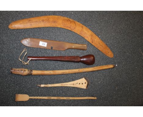 AN AUSTRALIAN ABORIGINAL BOOMERANG, POLYNESIAN WOODEN BREADFRUIT KNIFE, ZULU AXE HANDLE, MASAI CLUB ETC