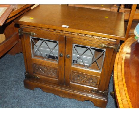 AN OAK ' OLD CHARM ' LEADED TV CABINET WITH VIDEO/DVD RECORDER