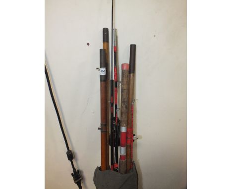 A SELECTION OF VINTAGE FISHING RODS