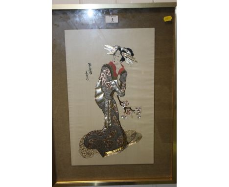 A FRAMED AND GLAZED ORIENTAL NEEDLEWORK PORTRAIT