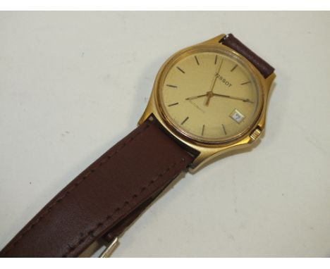 A VINTAGE TISSOT 25 JEWEL AUTOMATIC WRIST WATCH