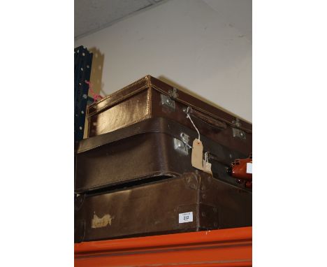 A VINTAGE LEATHER BRIEFCASE TOGETHER WITH TWO SUITCASES (3) 