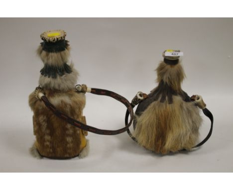 A PAIR OF VINTAGE BONE HUNTING FLASKS 