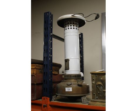 AN UNUSUAL VINTAGE OIL BURNING HEATER ;