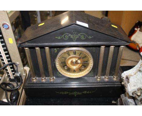 A SLATE MANTEL CLOCK 