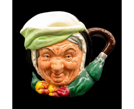 Black hair; light green band; dark green coat; yellow and burgundy bow.Royal Doulton backstamp. Charles Dickens series. Good 