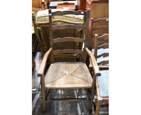 A traditional rush seated ladder back chair