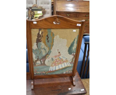 A stained frame fire screen having crinoline lady panel