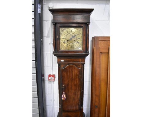 A late 18th Century stained softwood longcase clock having 8 day movement and brass dial, named Jonas Barber, sold together w