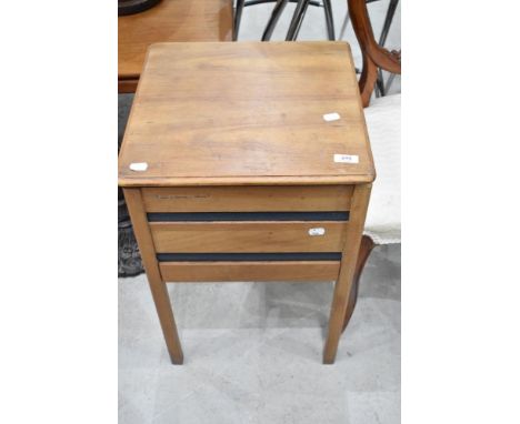 A vintage sewing table and contents including haberdashery, patterns, bobbin reels etc
