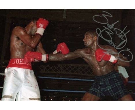 Herol Bomber Graham 8x12 Inch Photo Signed by Legendary Boxer Herol Bomber Graham.  Good condition. All signed items come wit
