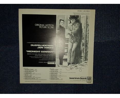 John Barry autographed record. 12 inch record of the soundtrack of Midnight Cowboy, autographed on the reverse of the sleeve 